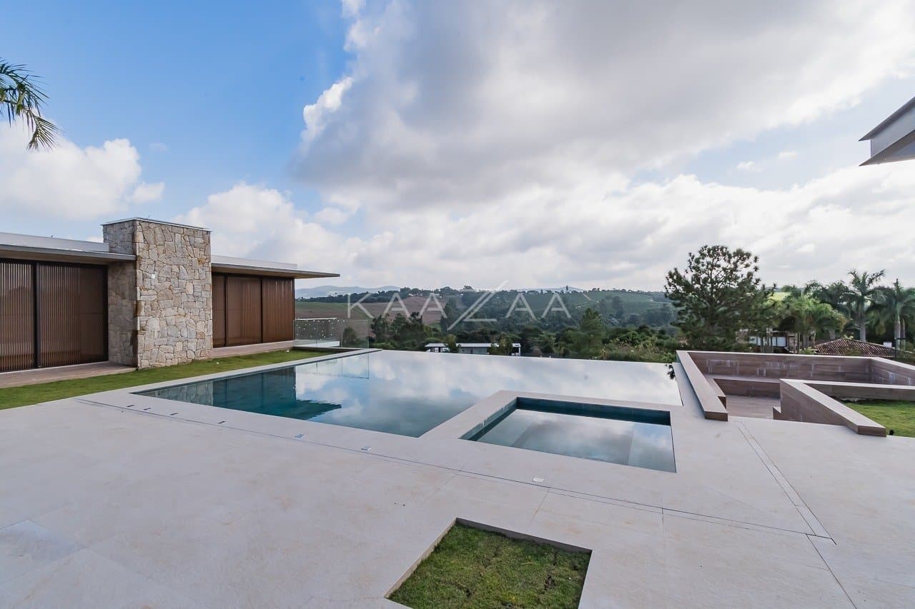 Um projeto de casa de campo feito para limpar a vista e se inspirar. No condomínio Quinta da Baroneza. - Foto 7