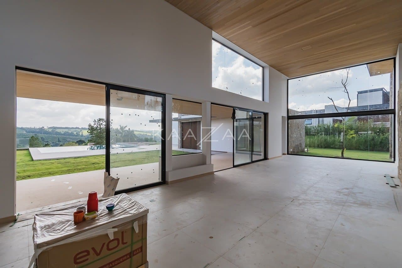 Um projeto de casa de campo feito para limpar a vista e se inspirar. No condomínio Quinta da Baroneza. - Foto 14