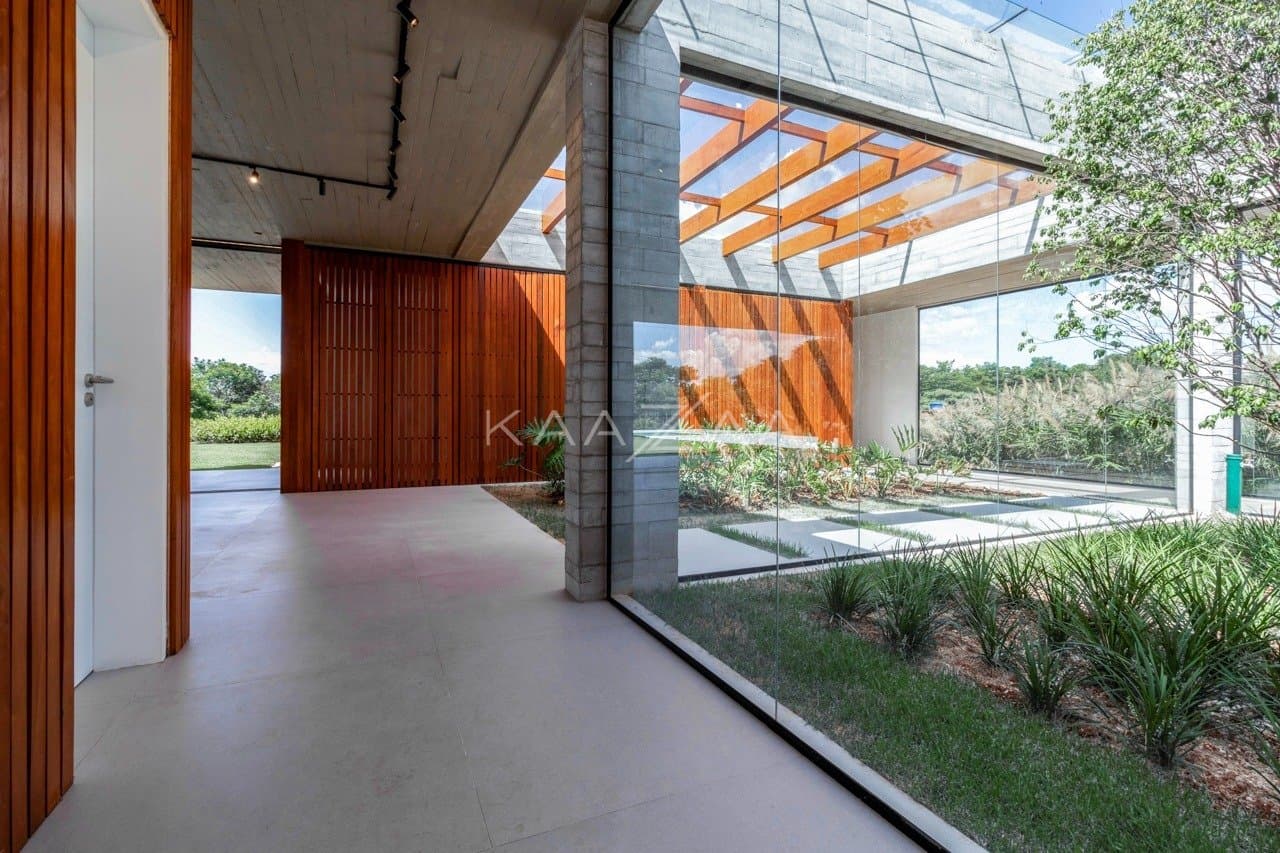 Casa em elegante diálogo com a natureza na Baroneza - Foto 17