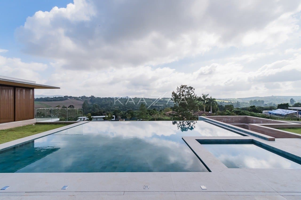 Um projeto de casa de campo feito para limpar a vista e se inspirar. No condomínio Quinta da Baroneza. - Foto 9